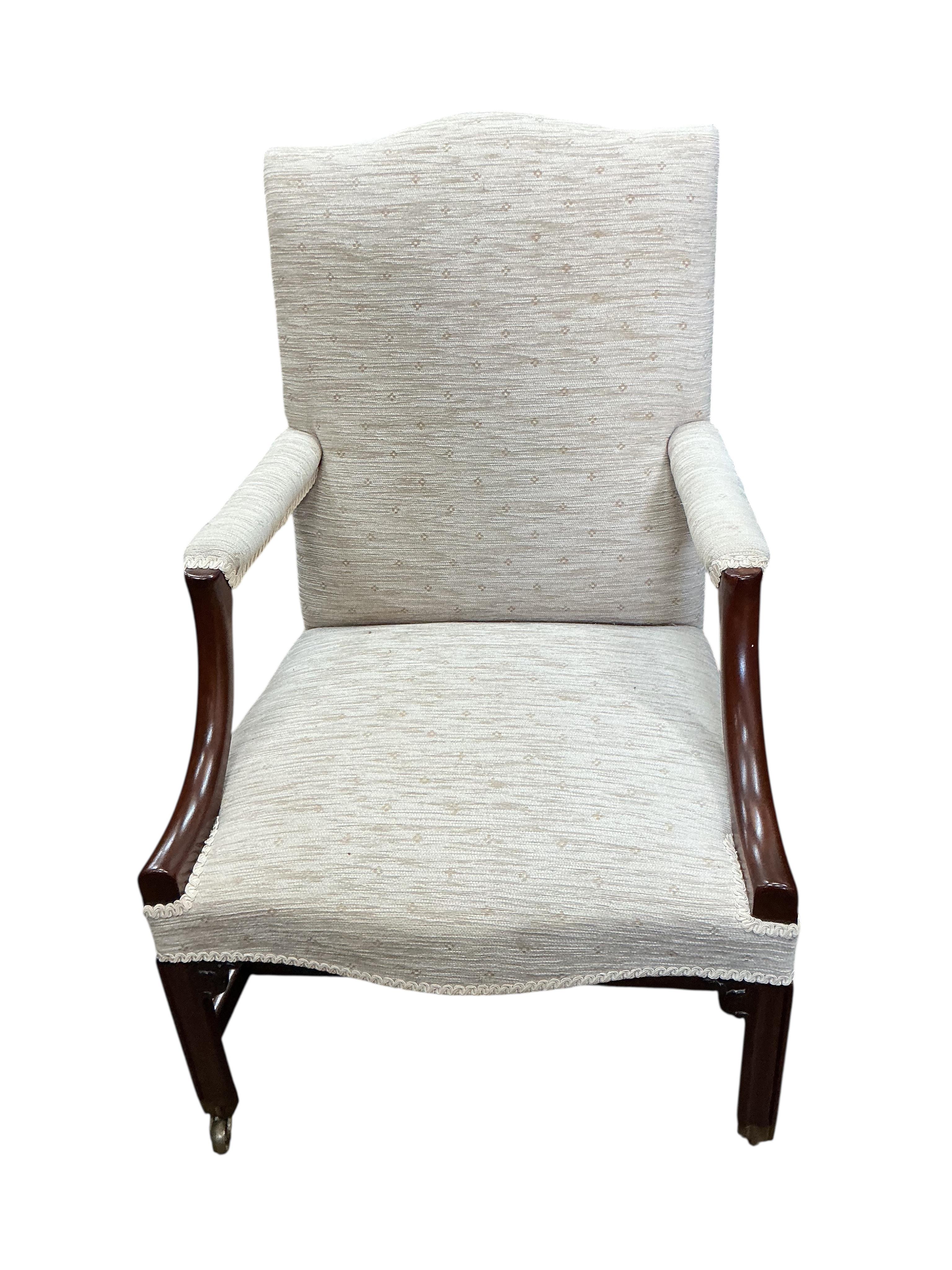 A George III and later Gainsborough type mahogany armchair, width 62cm, depth 65cm, height 96cm